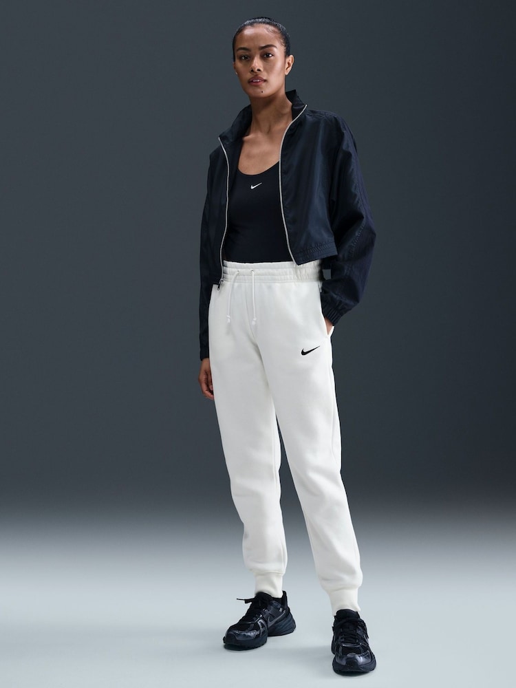Natural - Pantalones deportivos de polar de tiro medio Phoenix de Nike - Imagen 1 de 5 Natural - Pantalones deportivos de polar de tiro medio Phoenix de Nike - Imagen 1 de 5