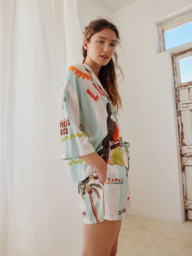 Blau, Streifen, Tukan - Kurzer Pyjama mit durchgeknöpftem Oberteil - Bild 2 von 8 Blau, Streifen, Tukan - Kurzer Pyjama mit durchgeknöpftem Oberteil - Bild 2 von 8