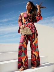 Red Geometric Print Satin Textured Elasticated Waist Trousers - Image 1 of 8