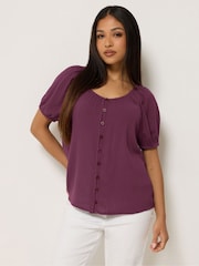 M&Co Purple Petite Crinkle Rayon Short Sleeve Blouse - Image 1 of 5