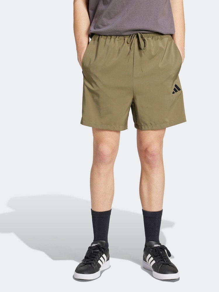 adidas Green Essentials 3-Stripes Chelsea Shorts - Image 1 of 6