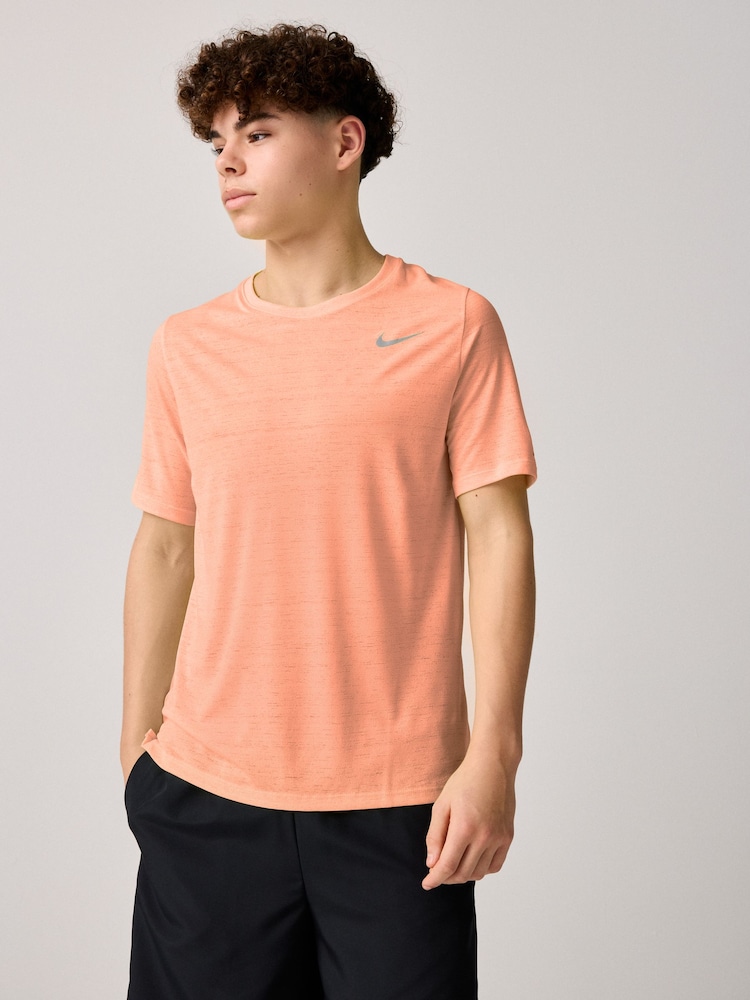 rožnata - Trening majica Nike Dri-FIT Miler - Slika 1 iz 3