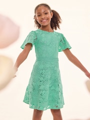 Lipsy Green Flutter Sleeve Lace Occasion Dress (5-16yrs) - Image 1 of 4