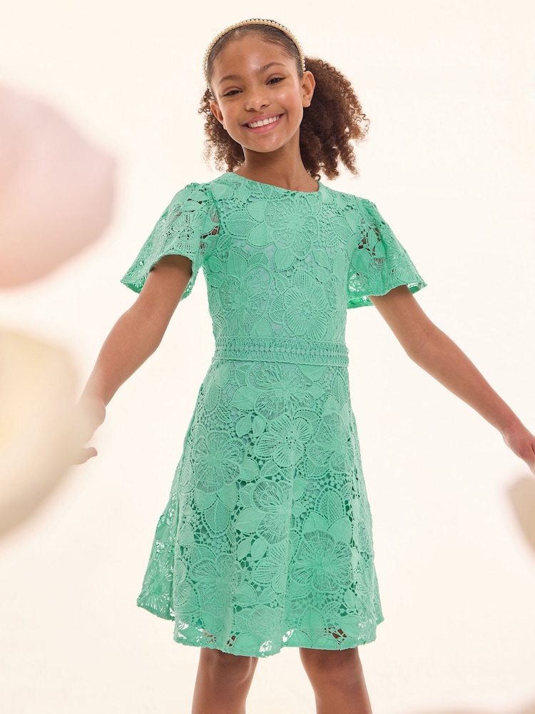 Lipsy Green Flutter Sleeve Lace Occasion Dress (5-16yrs) - Image 1 of 4