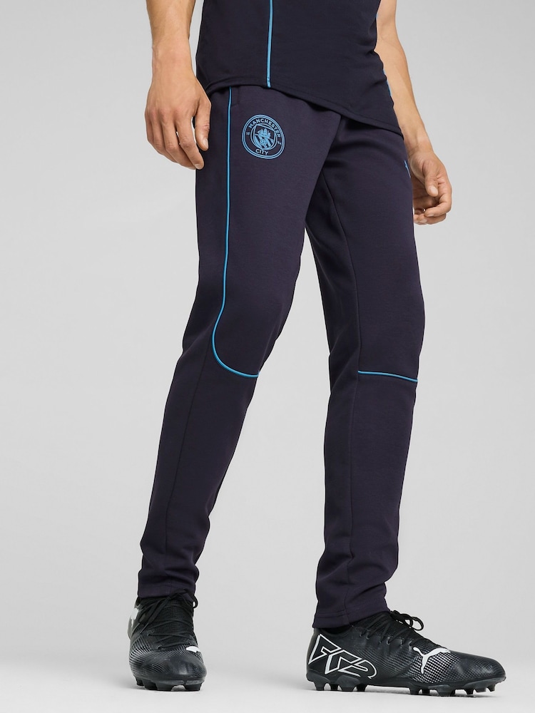 Puma Blue Manchester City Casuals Trousers - Image 1 of 3 Puma Blue Manchester City Casuals Trousers - Image 1 of 3