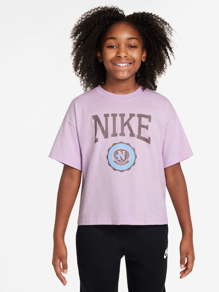 Nike Doll Lilac Boxy Varsity Graphic Print T-Shirt - Image 1 of 3 Nike Doll Lilac Boxy Varsity Graphic Print T-Shirt - Image 1 of 3