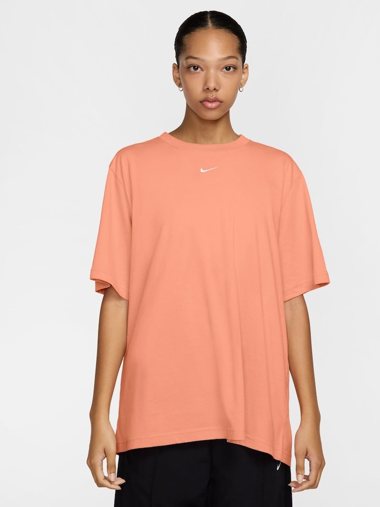 Nike Apricot Orange Oversized Mini Swoosh Sportswear T-Shirt - Image 1 of 3