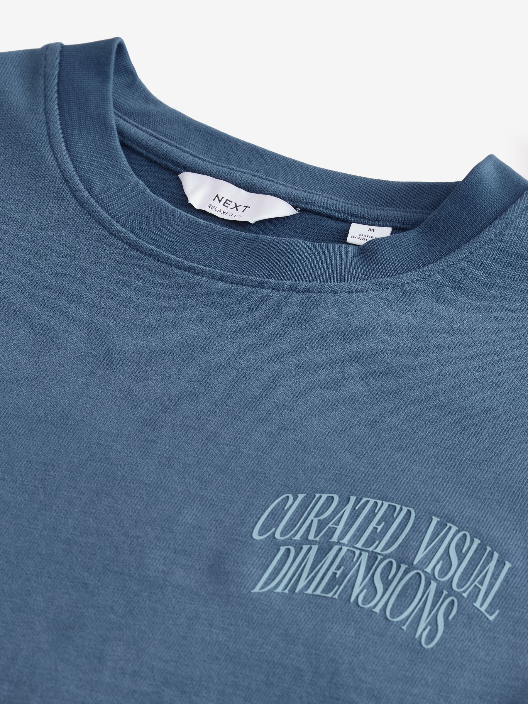 Tシャツ・カットソー OAMC Rings Graphic Print Short Sleeve T-Shirt Midnight Blue Buy Blue Script Text Relaxed Fit Graphic Print Heavy Weight