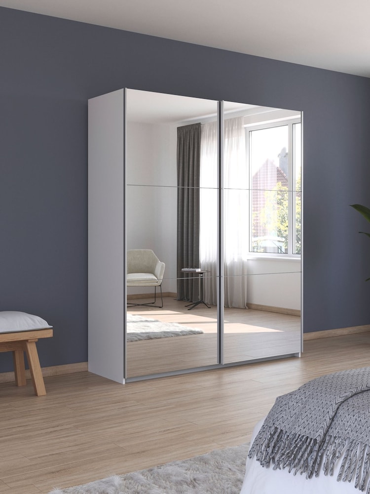 Rauch White Reflection Mirror Sliding Semi Fitted 1.8m Sliding Wardrobe with Additional Interior Shelves - Image 1 of 6