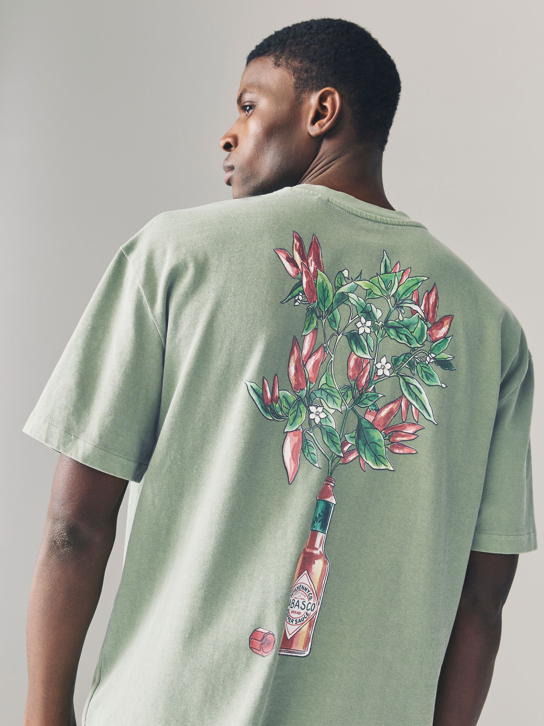 Buy Green Wash Tabasco Licence Graphic 100% Cotton T-Shirt from