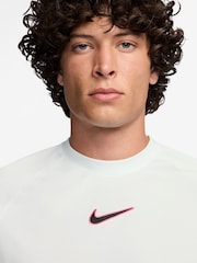 Bela - Majica s kratkimi rokavi in grafiko Nike Strike Training - Slika 3 iz 3