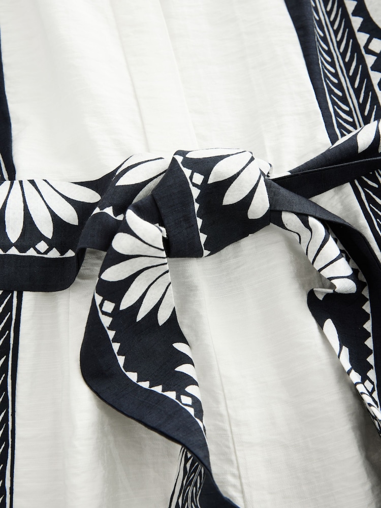 White/Black Placement Floral Short Sleeve Tie Waist Placket Detail Jumpsuit - Image 7 of 8