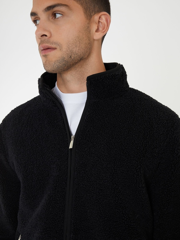 Schwarz - Threadbare – Fleecejacke mit neutralem Reißverschluss und Trichterkragen - Bild 4 von 4 Schwarz - Threadbare – Fleecejacke mit neutralem Reißverschluss und Trichterkragen - Bild 4 von 4