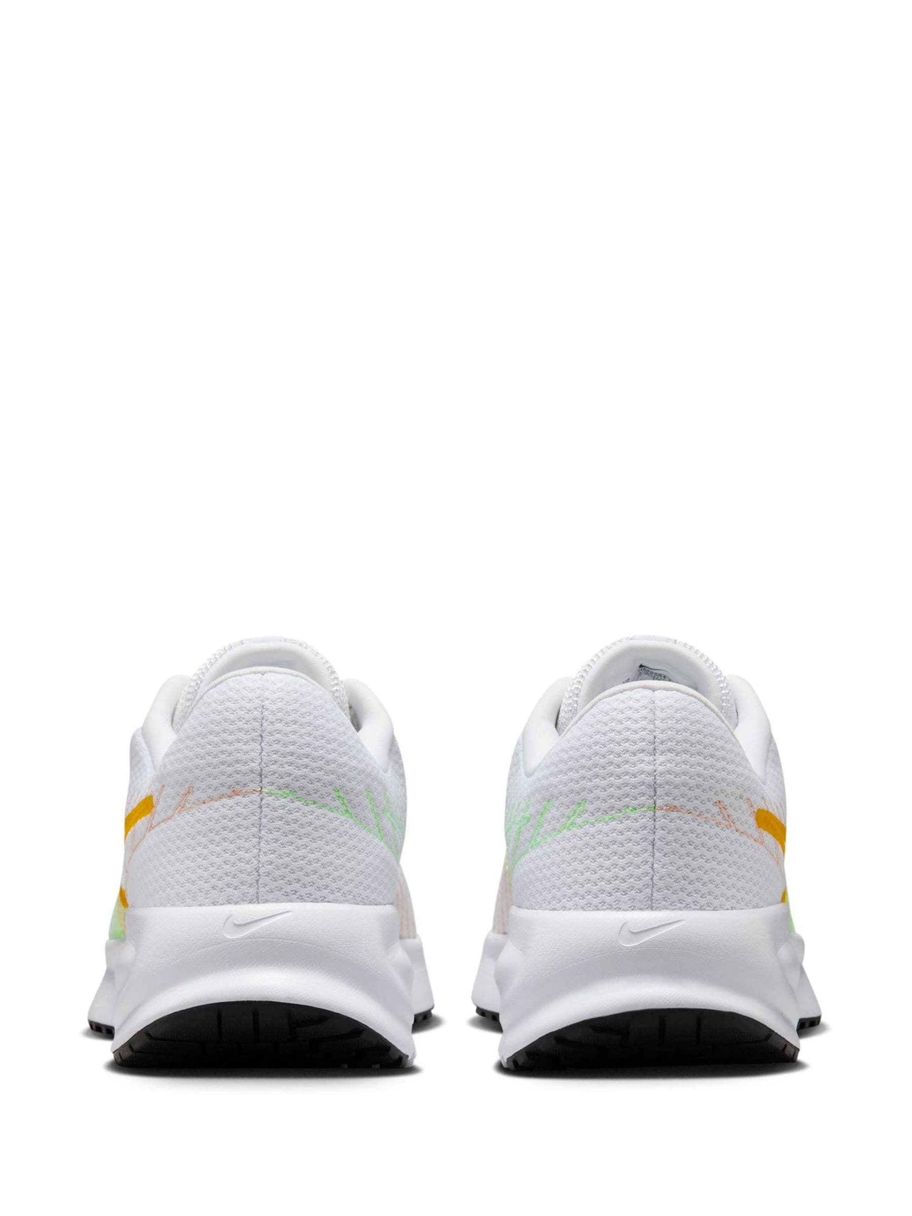 Comprar Amarelo/Branco - Tênis de corrida Nike Run Defy para