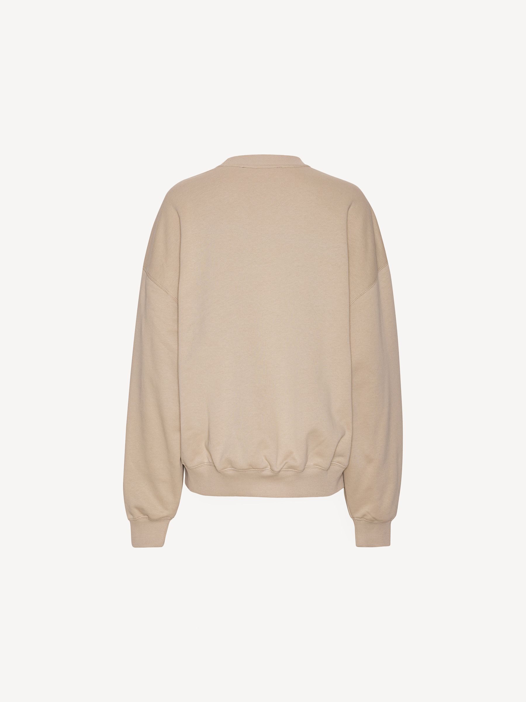 Buy Rotate Cream Heavy Crewneck Sweatshirt from Next USA