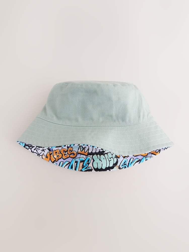 Skull Grafitti Print 100% Cotton Reversible Bucket Hat (1-16yrs) - Image 1 of 4 Skull Grafitti Print 100% Cotton Reversible Bucket Hat (1-16yrs) - Image 1 of 4