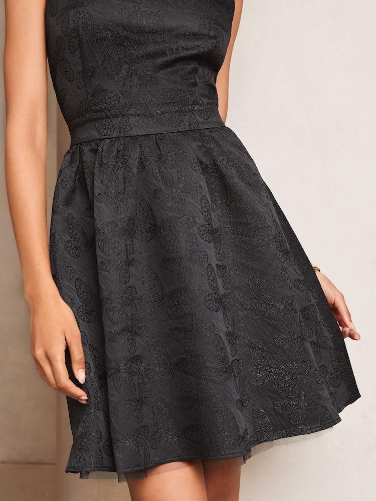 Minivestido de fiesta skater en jacquard de mariposas de Lipsy - Imagen 2 de 4 Minivestido de fiesta skater en jacquard de mariposas de Lipsy - Imagen 2 de 4