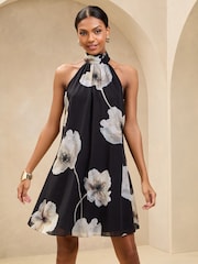 Lipsy Black/White Floral Print Halter Mini Swing Dress - Image 1 of 4