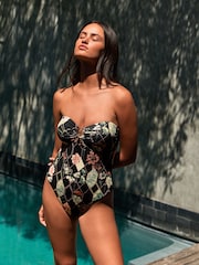 B by Ted Baker Floral Print Tummy Control Bandeau Black Swimsuit with Removable Straps - Imagen 1 de 6