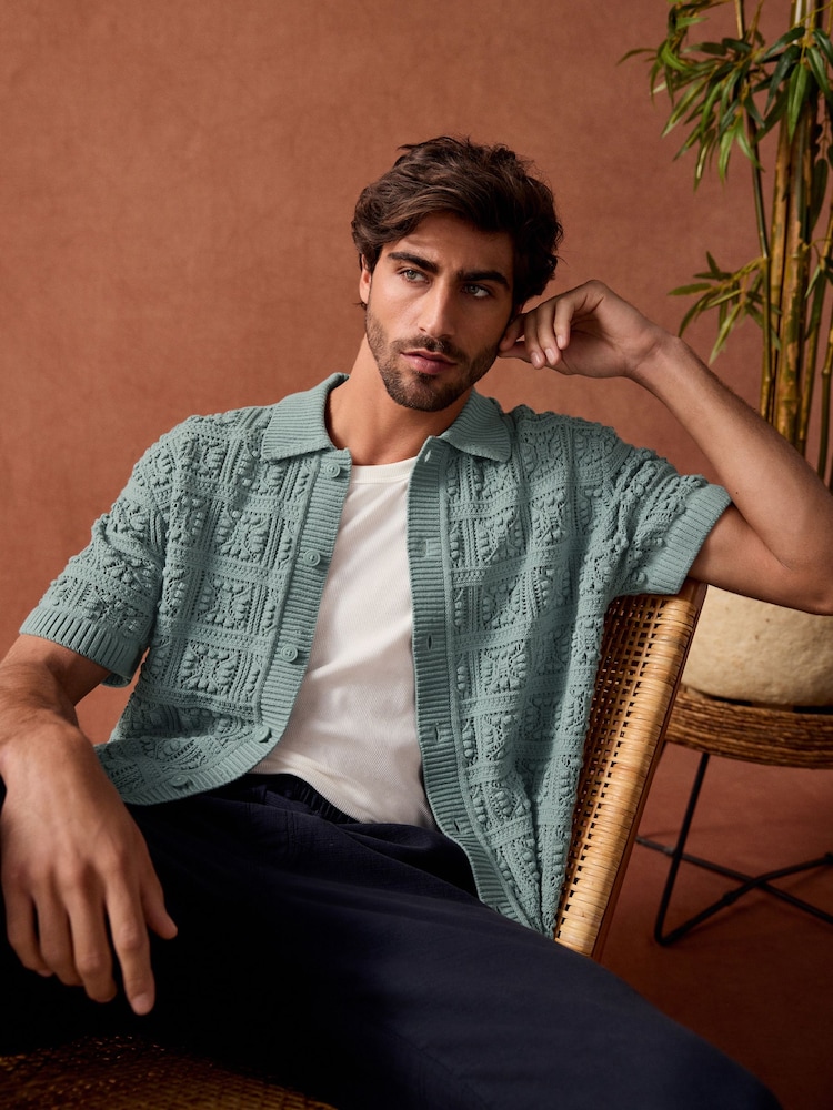 Light Blue Relaxed Fit Cotton Rich Short Sleeve Flower Crochet Knit Button-Through Polo Shirt - Image 1 of 9 Light Blue Relaxed Fit Cotton Rich Short Sleeve Flower Crochet Knit Button-Through Polo Shirt - Image 1 of 9