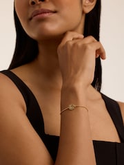 Ted Baker Gold Tone Florina Crystal Flower Adjustable Bracelet - Image 1 of 4