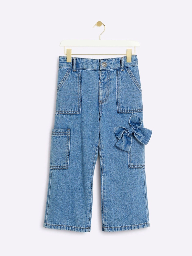 River Island Blue Girls BOWS Carpenter Straight 100% Cotton Jeans - Image 1 of 4 River Island Blue Girls BOWS Carpenter Straight 100% Cotton Jeans - Image 1 of 4