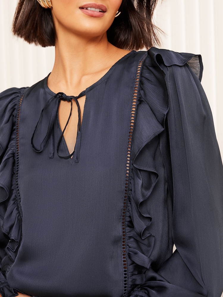 Friends Like These Navy Long Sleeve Ruffle Trim Tie Front Blouse - Image 2 of 4