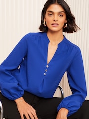 Friends Like These Blue Long Sleeve Button Notch Neck Blouse - Image 1 of 4