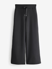 أسود - بنطلون رِجل واسعة AirEssentials® من Spanx - صورة 7 من 7