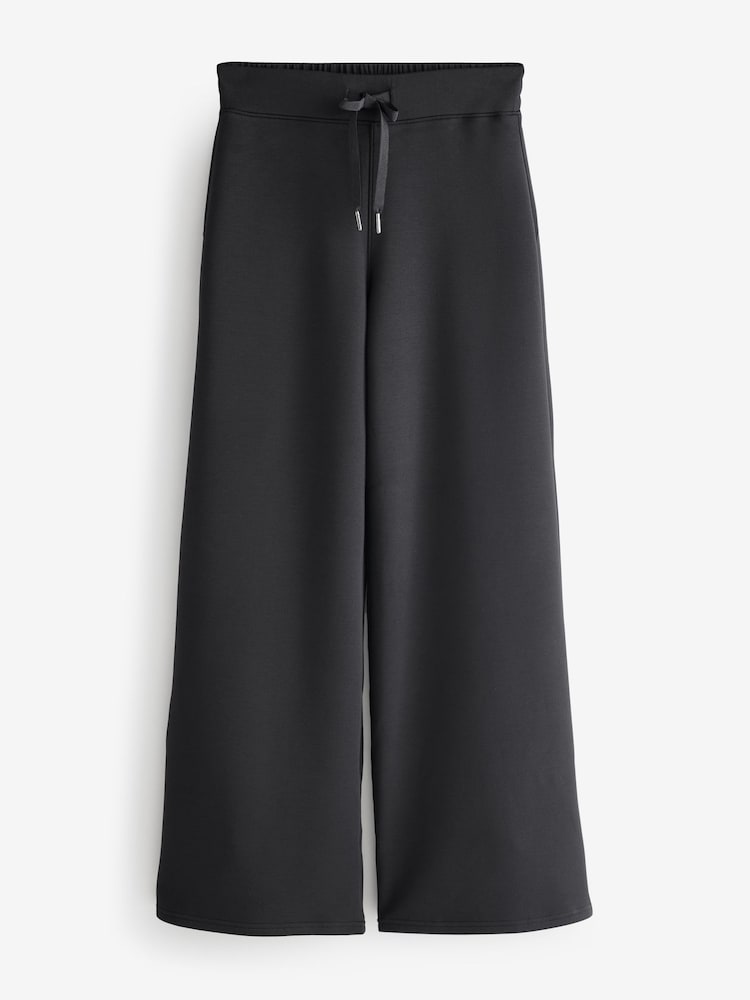 أسود - بنطلون رِجل واسعة AirEssentials® من Spanx - صورة 7 من 7