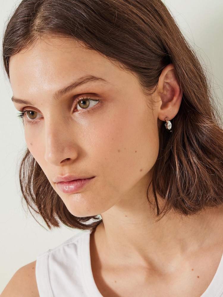 Hush Silver Tone Wave Huggie Hoop Earrings - Image 1 of 4