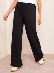 Friends Like These Black Petite Ribbed Jersey Wide Leg Trousers - Image 1 of 4