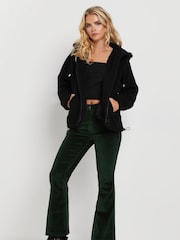 PixieGirl Petite Green Corduroy Kick Flare Trousers - Image 1 of 5