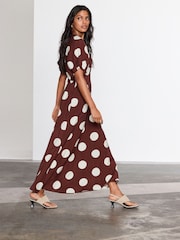 Marrón chocolate de lunares - Vestido a media pierna con mangas abullonadas - Imagen 1 de 3