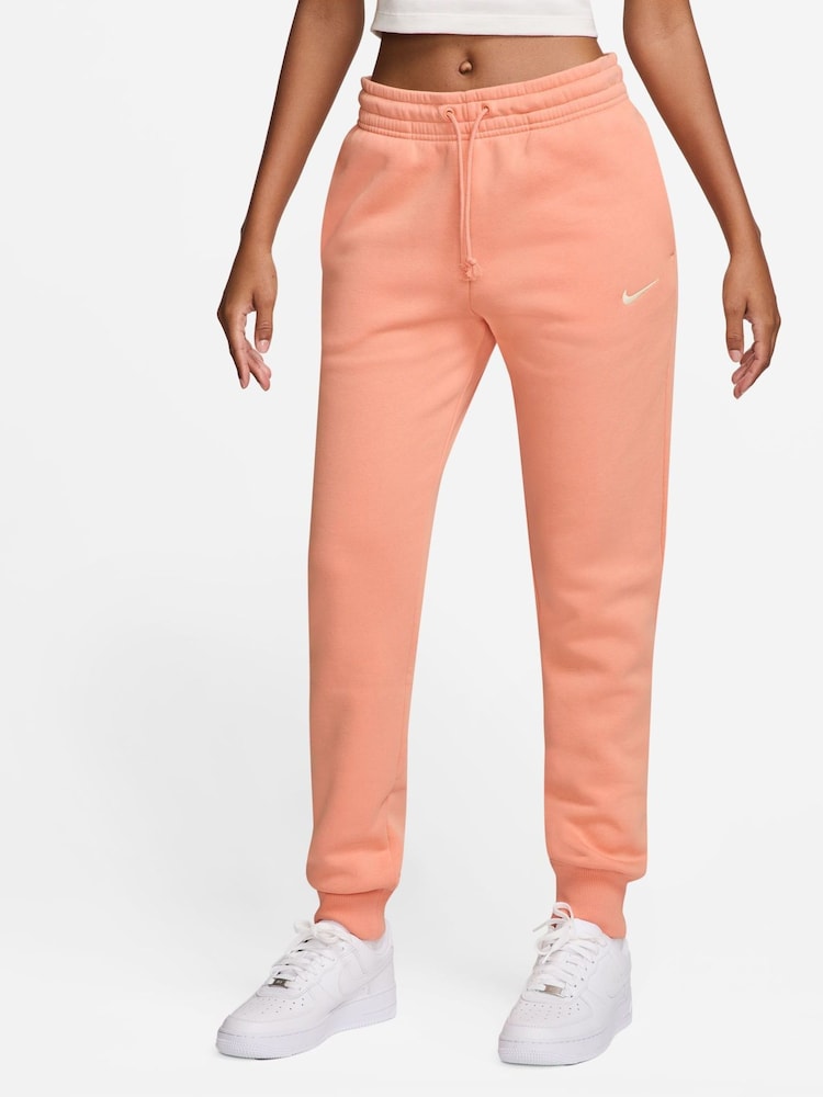 Nike Apricot Orange Phoenix Fleece Mid Rise Joggers - Image 1 of 3