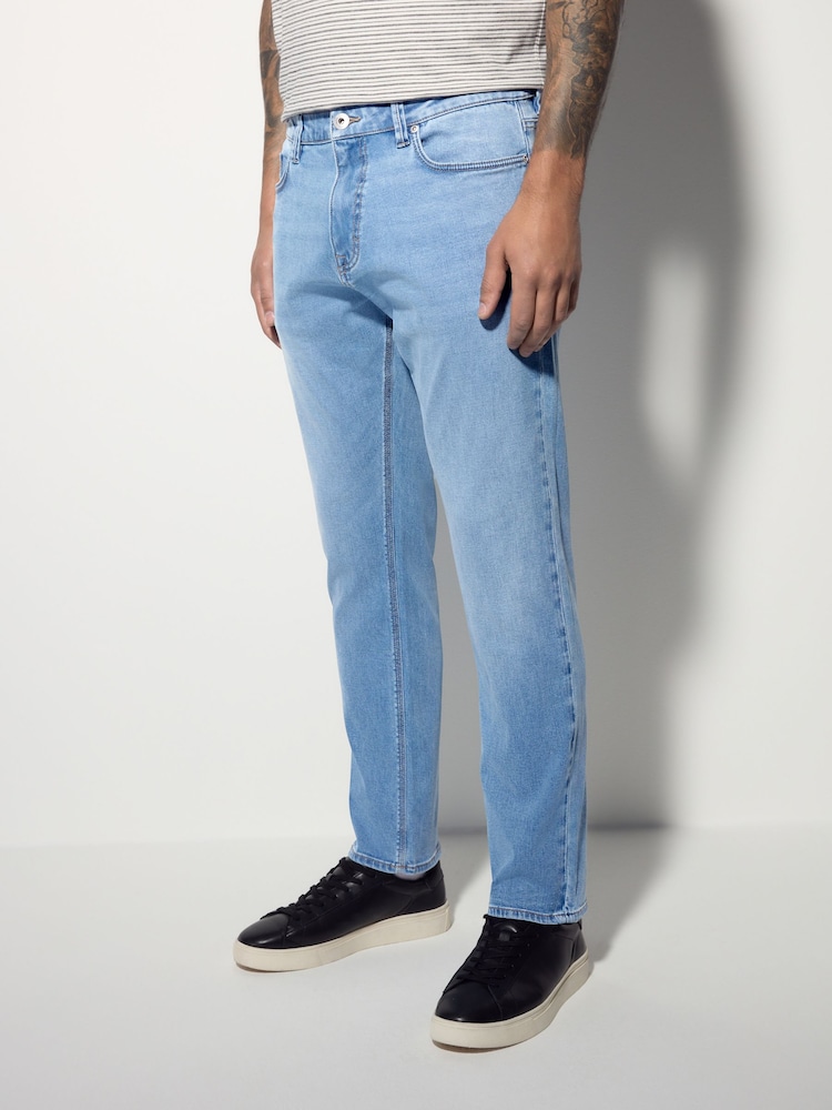 Blue Light Slim Fit Lightweight Motion Flex Denim Jeans - Image 1 of 12