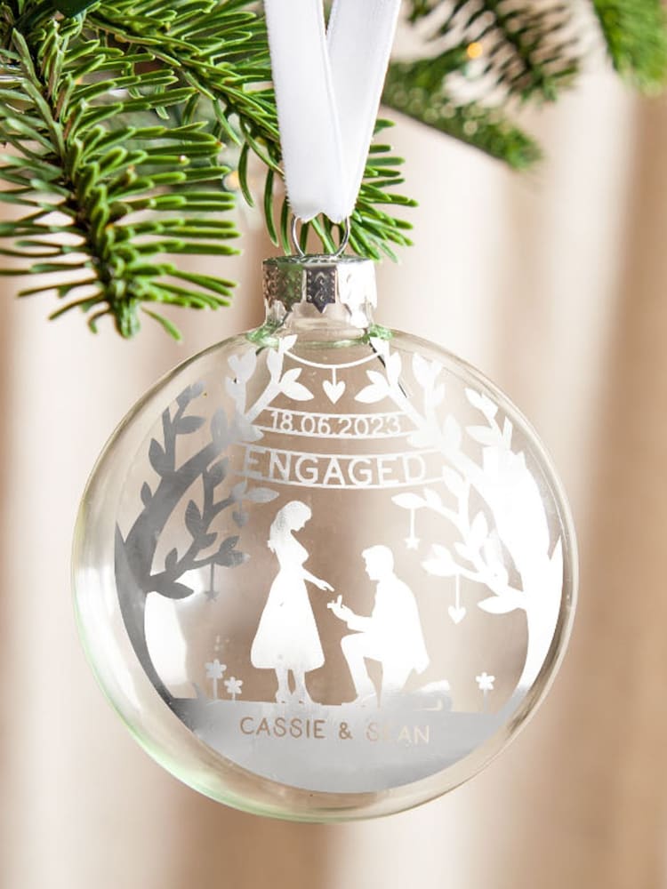 Couple's Foiled Engagement Silhouette Christmas Bauble by No Ordinary Gift - Image 1 of 4