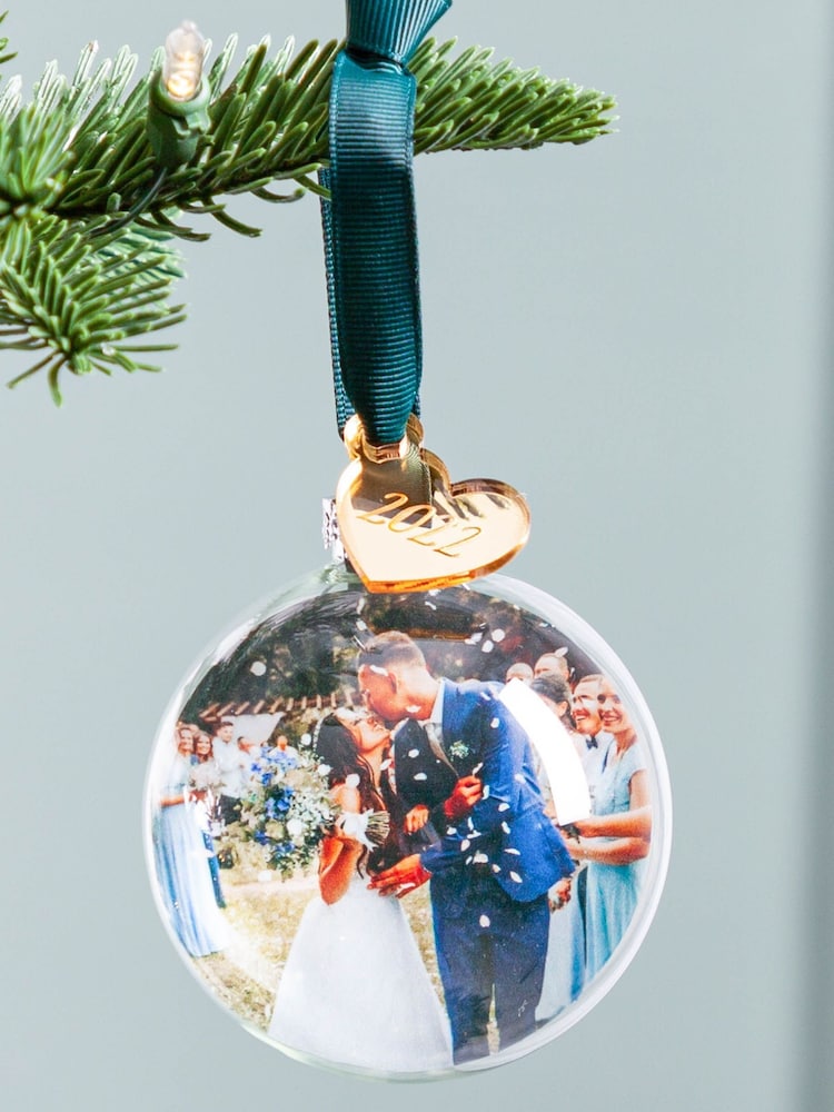 Personalised Couple's Christmas Photo Bauble with Gold Mirror Charm by No Ordinary Gift - Image 1 of 1