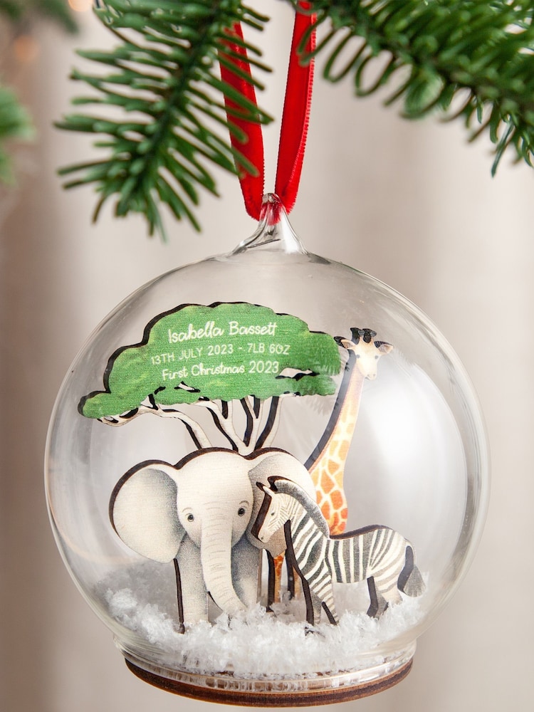 First Christmas Safari Animals Personalised Bauble by No Ordinary Gift - Image 1 of 2