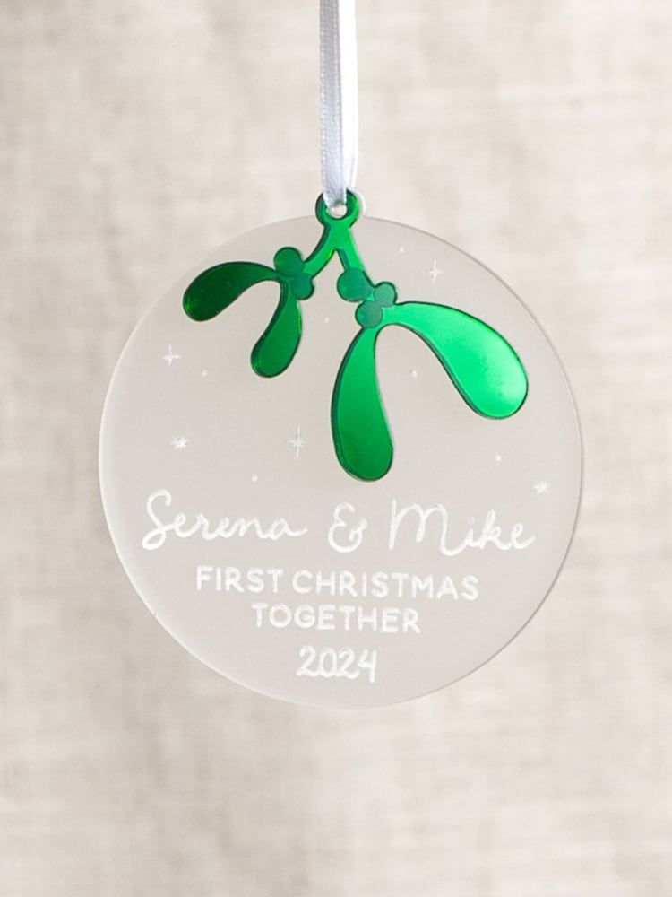 Personalised Hanging Christmas Decoration with Green Mistletoe Charm by No Ordinary Gift - Image 1 of 1