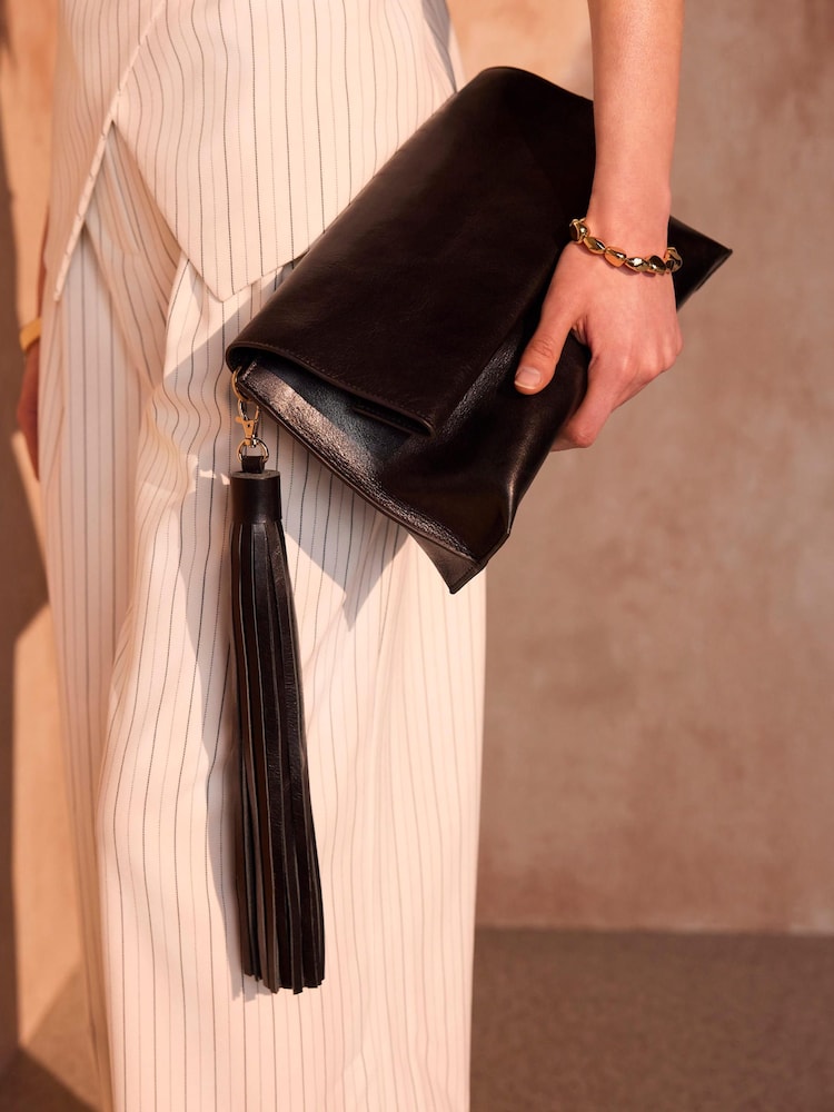Mint Velvet Black Daisy Leather Fold Over Tassel Clutch - Image 1 of 5 Mint Velvet Black Daisy Leather Fold Over Tassel Clutch - Image 1 of 5