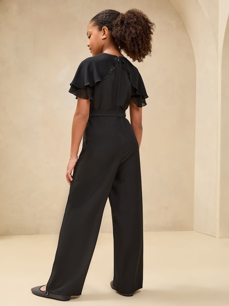 Lipsy Layered Flutter Sleeve Jumpsuit (5-16yrs) - Imagen 4 de 4 Lipsy Layered Flutter Sleeve Jumpsuit (5-16yrs) - Imagen 4 de 4