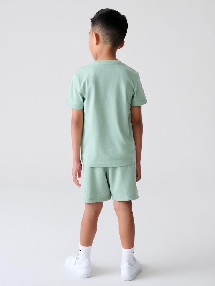 zelena - Komplet majice s kratkimi rokavi in kratkih hlač Nike Little Kids Club - Slika 2 iz 9 zelena - Komplet majice s kratkimi rokavi in kratkih hlač Nike Little Kids Club - Slika 2 iz 9