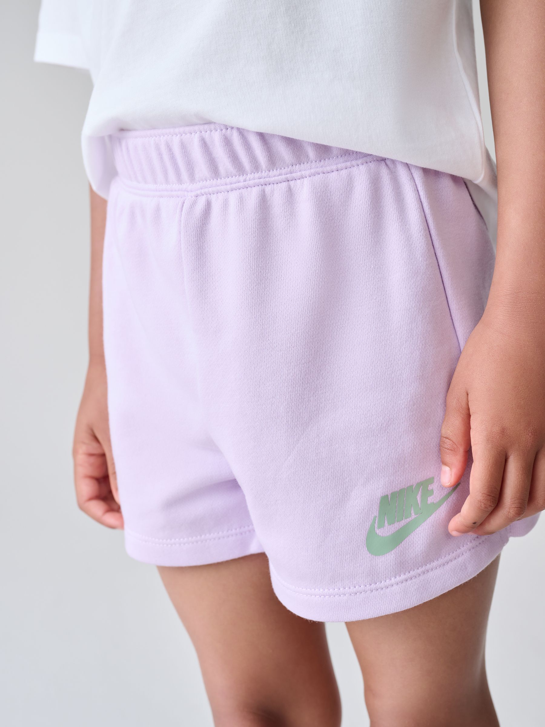 lilac nike woven shorts