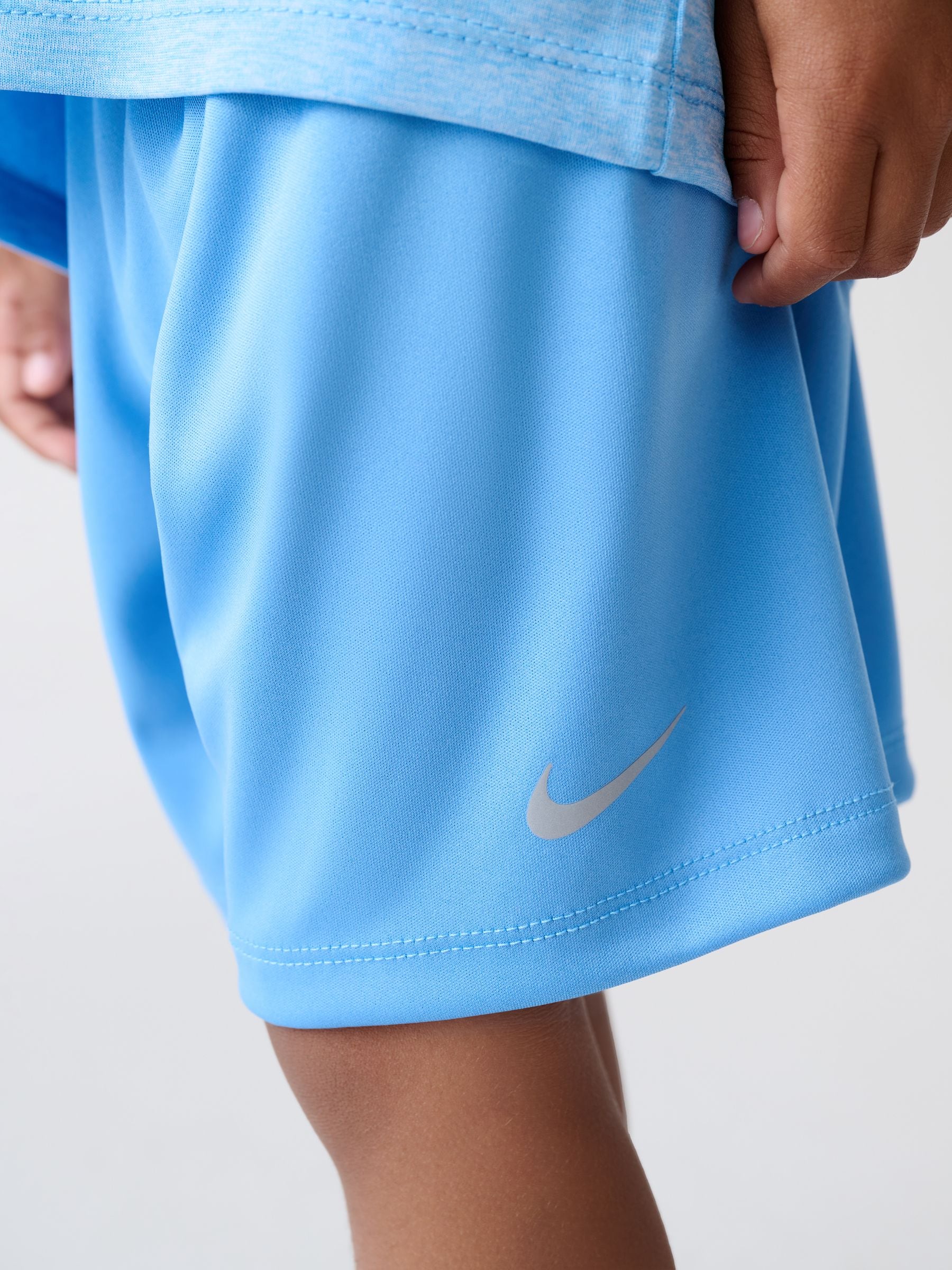 nike dri fit shorts light blue
