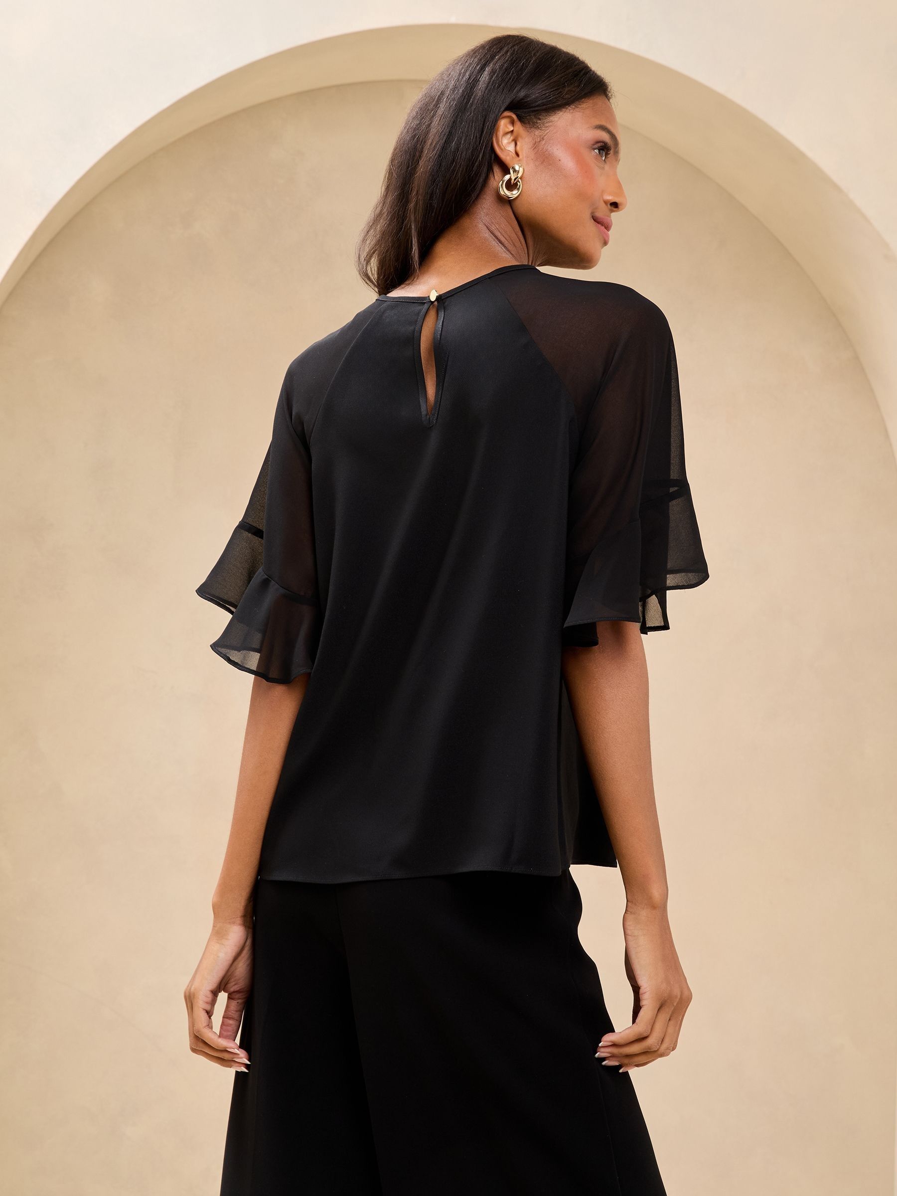 Buy Lipsy Black Ruffle Sheer Sleeve Blouse from Next USA