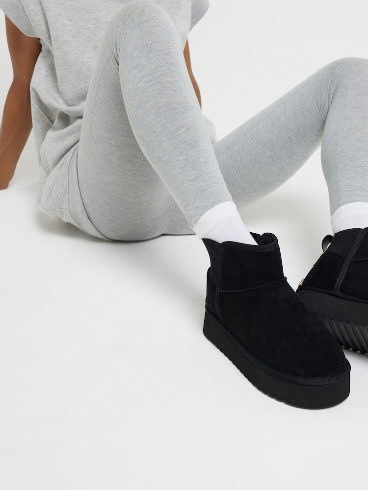River Island Black Faux Fur Lined Elastic Back Boots - Image 1 of 5