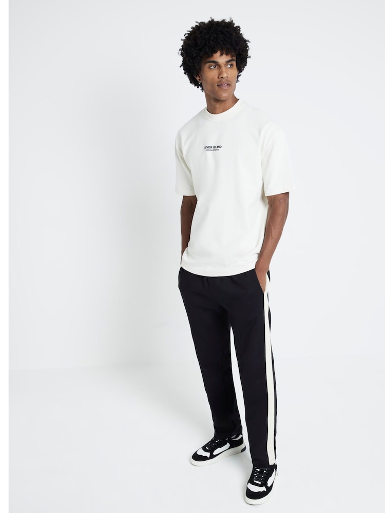 River Island Cream Regular Fit Studio Graphic 100% Cotton T-Shirt - Image 1 of 4