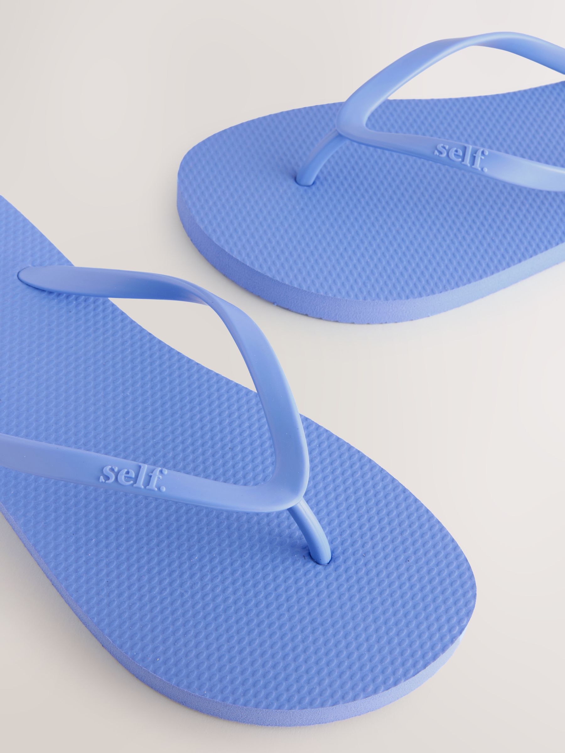 Buy self. Blue Self. Beach Flip Flops from Next Romania
