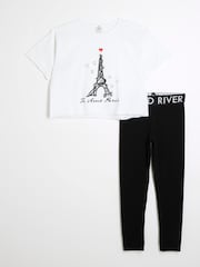 طقم من بنطلون ضيق وتيشِرت قطن 100% للبنات بتصميم Eiffel Tower من River Island - صورة 1 من 4